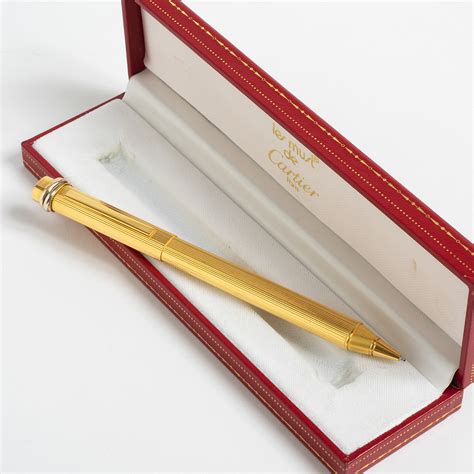 cartier gilded pen|must de cartier gold pen.